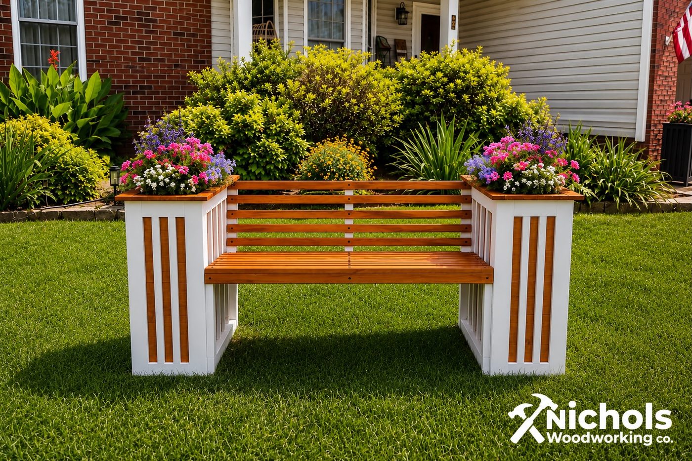 The Harlow Bench in Classic White with flowers in both built-in planters